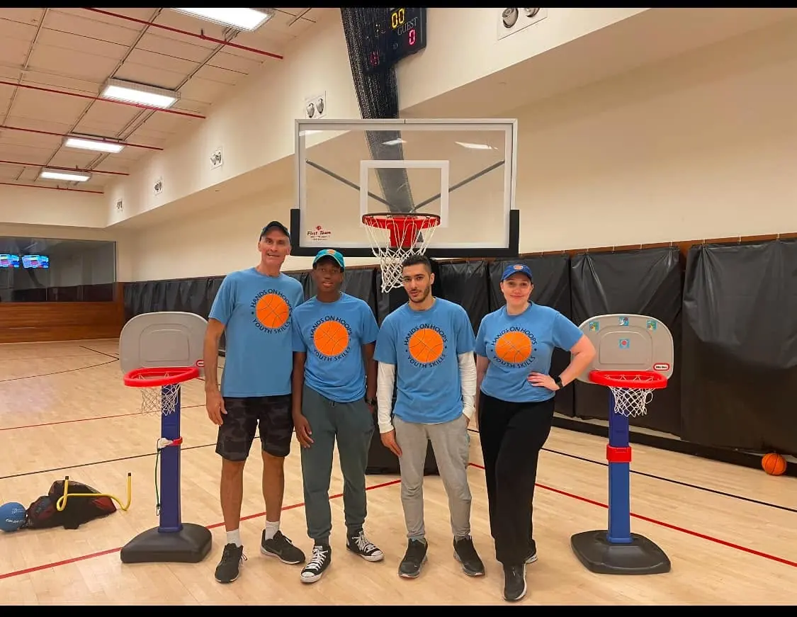 The Hands On Hoops coaching team in the gym